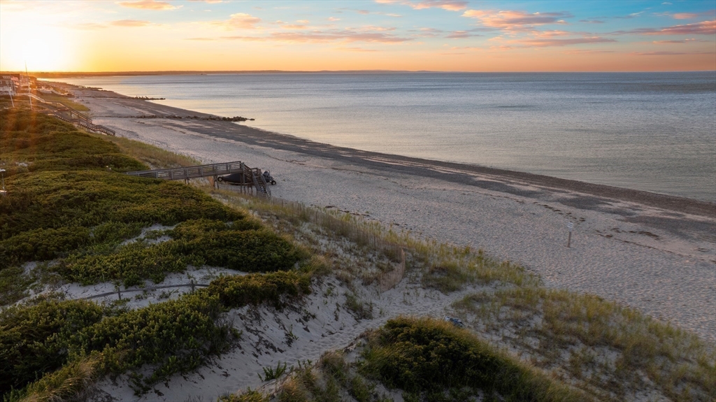 46 Roos Road Sandwich, MA 02537 - Photo 8 of 28 a view of an ocean beach