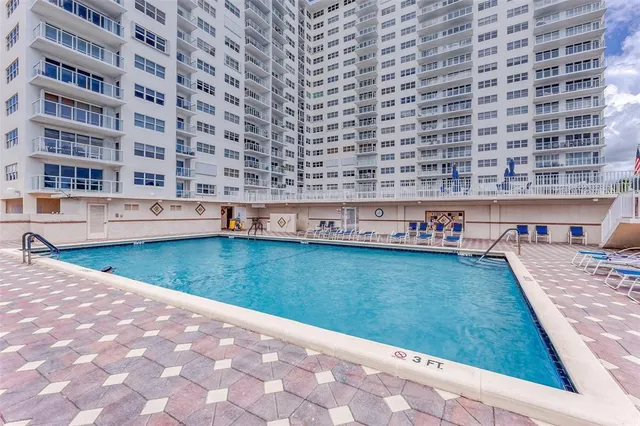 a view of a swimming pool and outdoor space