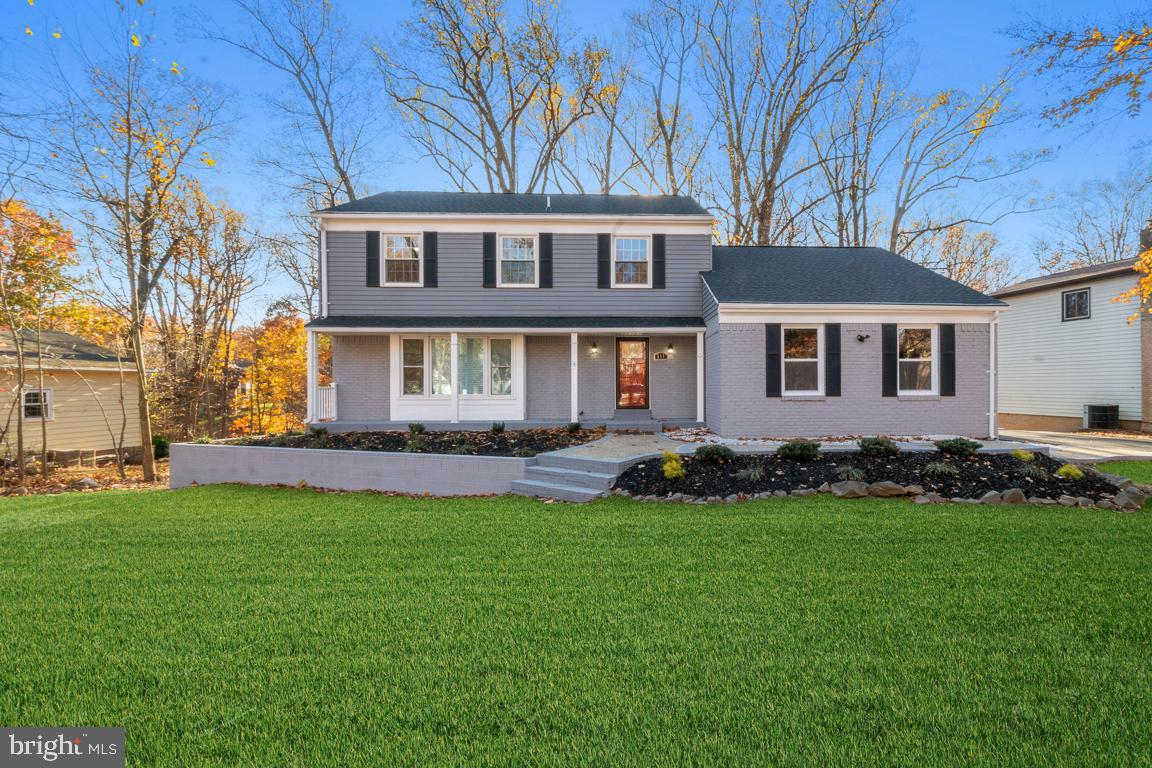 517 Holly Road Fort Washington, MD 20744 - Photo 1 of 40 front view of a house with a yard