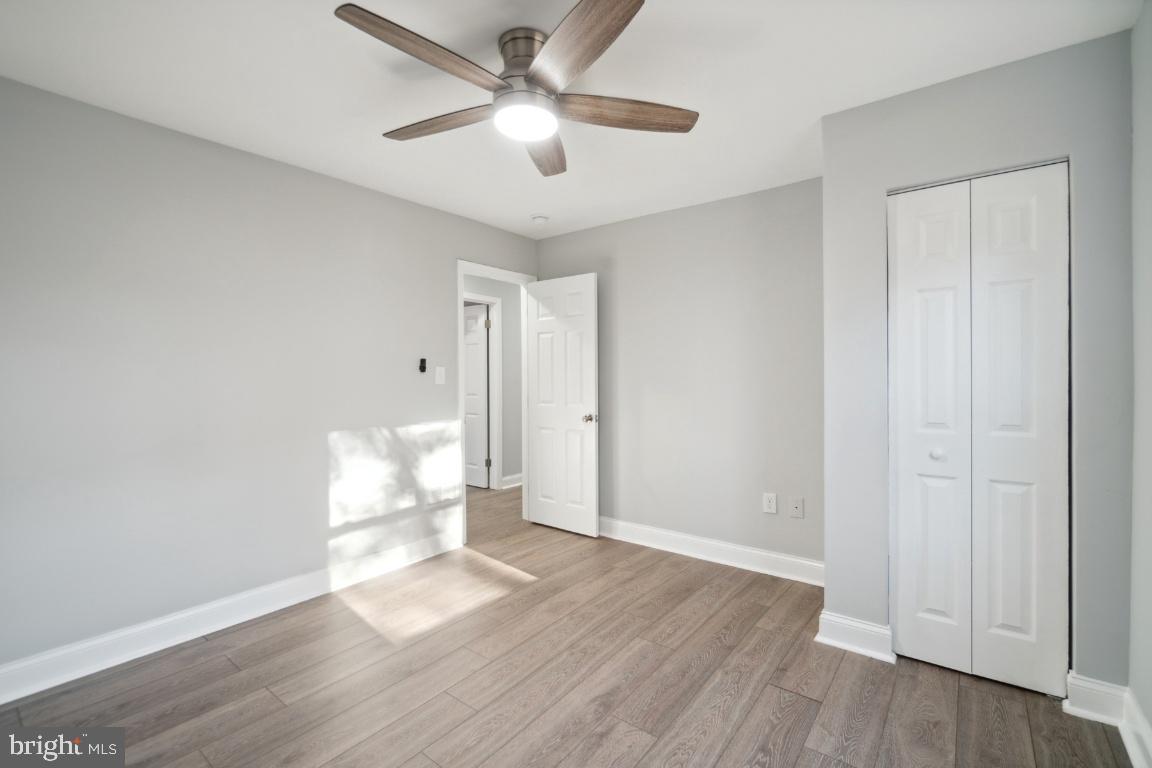 517 Holly Road Fort Washington, MD 20744 - Photo 17 of 40 a view of empty room with wooden floor