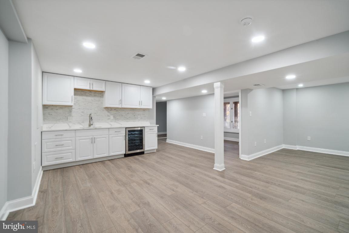 517 Holly Road Fort Washington, MD 20744 - Photo 23 of 40 a view of kitchen with stainless steel appliances cabinets and wooden floor
