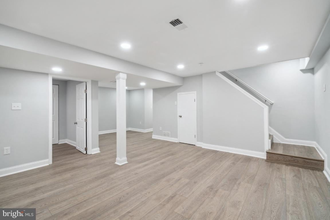 517 Holly Road Fort Washington, MD 20744 - Photo 24 of 40 a view of empty room with wooden floor