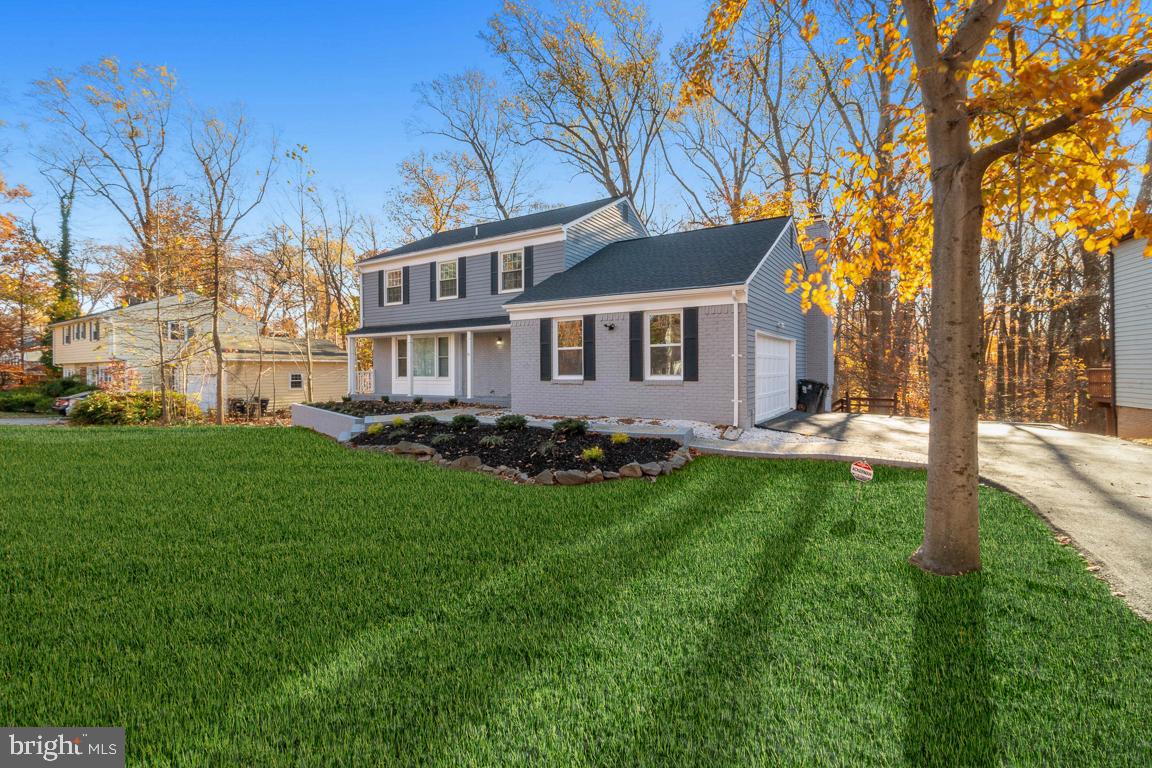 517 Holly Road Fort Washington, MD 20744 - Photo 3 of 40 a view of a house with a yard