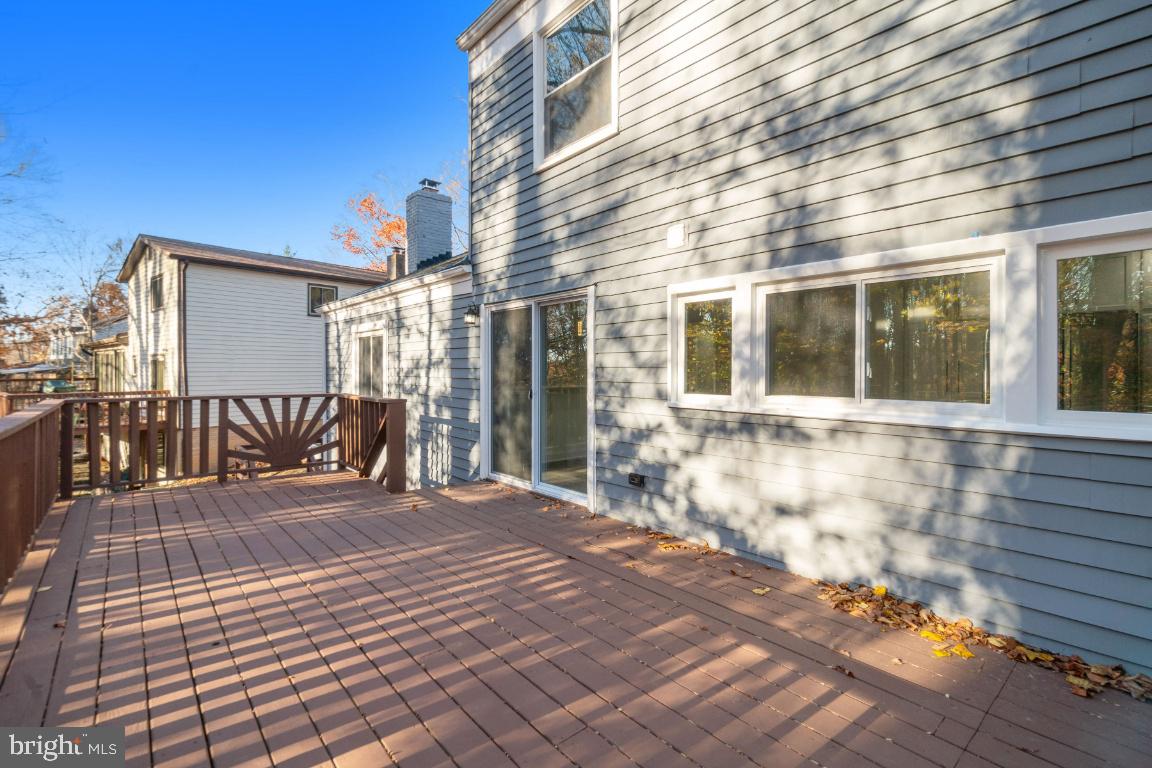 517 Holly Road Fort Washington, MD 20744 - Photo 37 of 40 a view of a house with wooden floor next to a yard