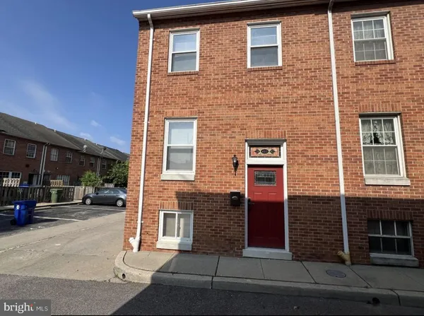 a front view of a building with windows