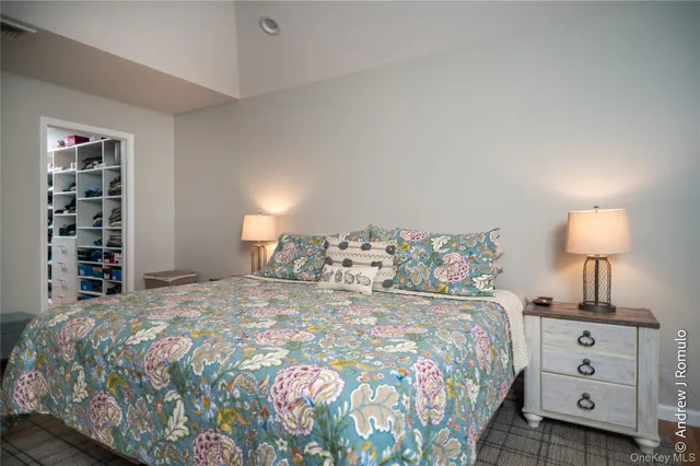 a bedroom with a bed and furniture