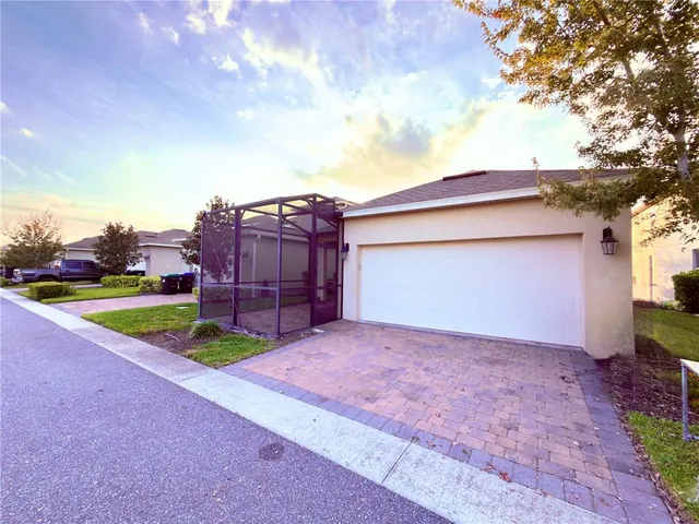 a white toilet sitting next to a shower