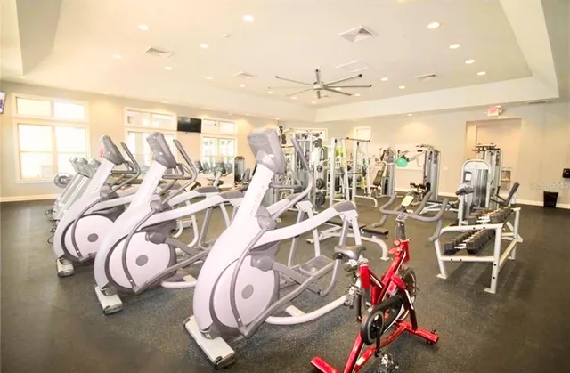 a view of swimming pool with a garden and trees