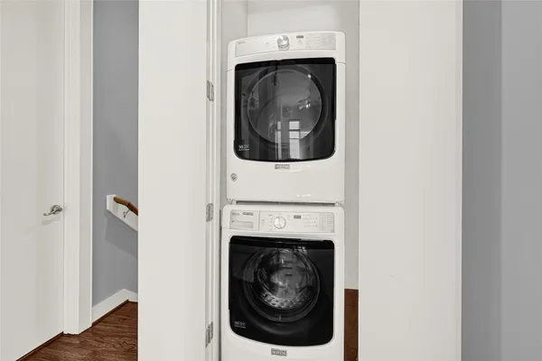a utility room with washing machine