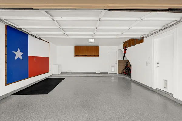 a view of a white building among the street