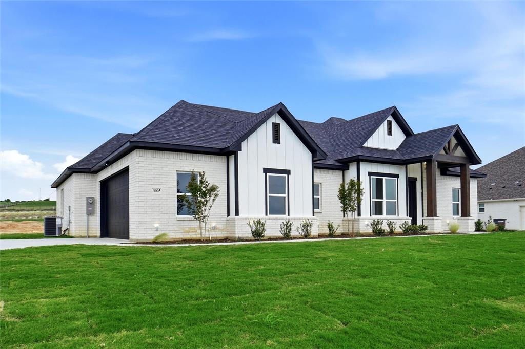 3005 Westfork Way Springtown, TX 76082 - Photo 3 of 39 Great Elevations with Up Lighting