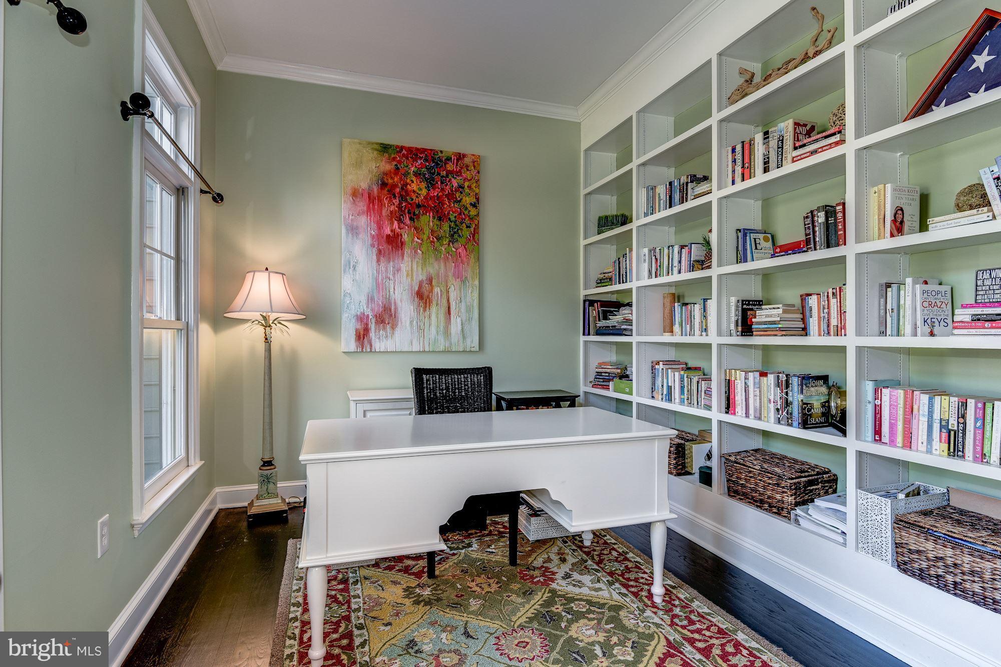 7730 Greentree Road Bethesda, MD 20817 - Photo 3 of 30 a view of a workspace with furniture