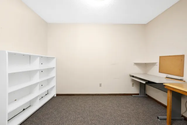 a room with a desk and a chair