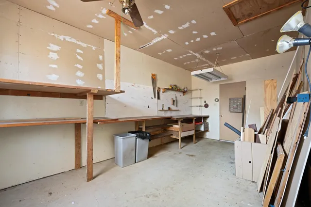 a view of kitchen with furniture and a window