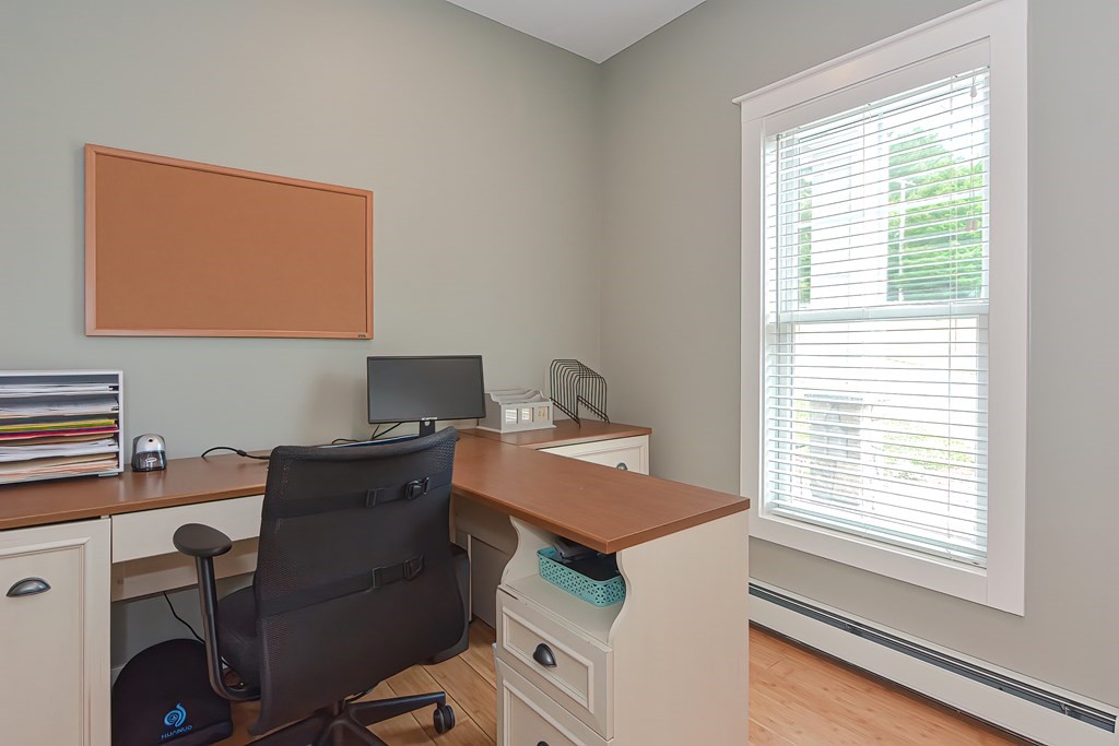 128 Nourse Road Bolton, MA 01740 - Photo 11 of 42 a workspace with furniture and window