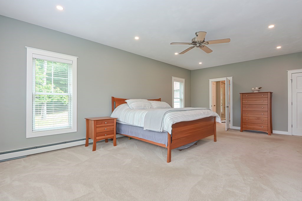 128 Nourse Road Bolton, MA 01740 - Photo 18 of 42 a bedroom with a bed and a window