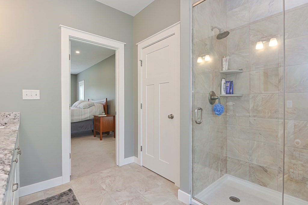 128 Nourse Road Bolton, MA 01740 - Photo 20 of 42 a en suite bathroom with a shower