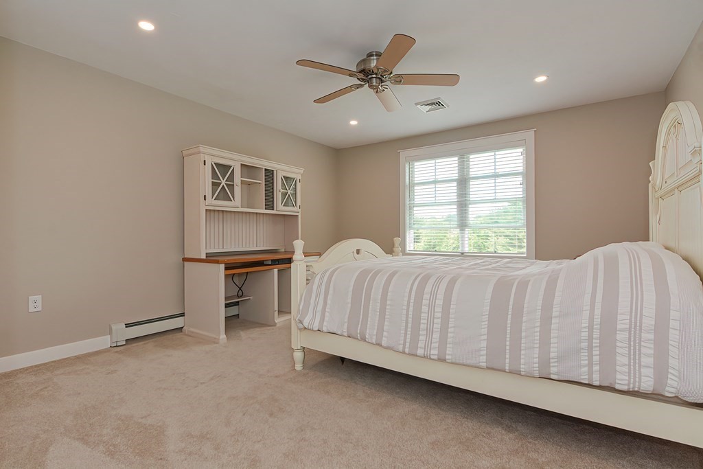 128 Nourse Road Bolton, MA 01740 - Photo 25 of 42 a bed room with a bed and a window