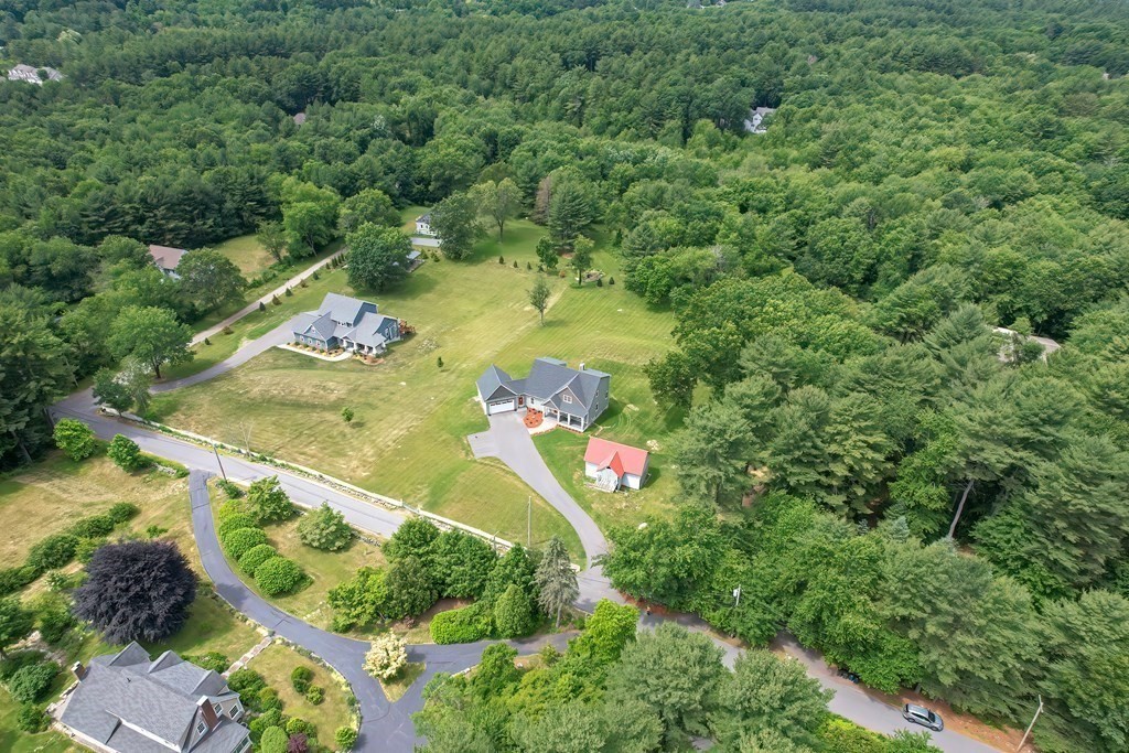 128 Nourse Road Bolton, MA 01740 - Photo 41 of 42 an aerial view of a house with a yard