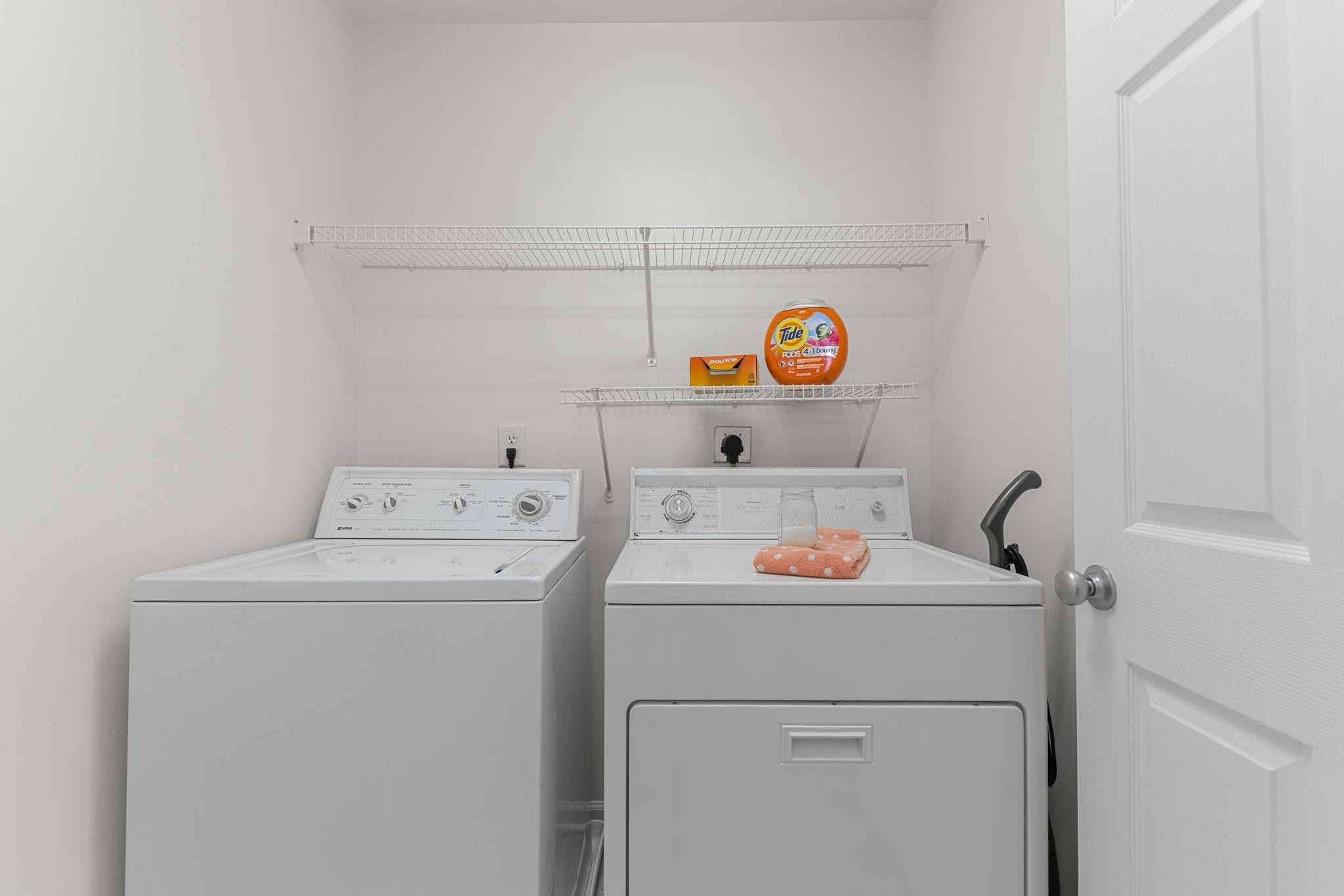 8411 Tie Stone Way Raleigh, NC 27613 - Photo 19 of 38 a utility room with dryer and washer