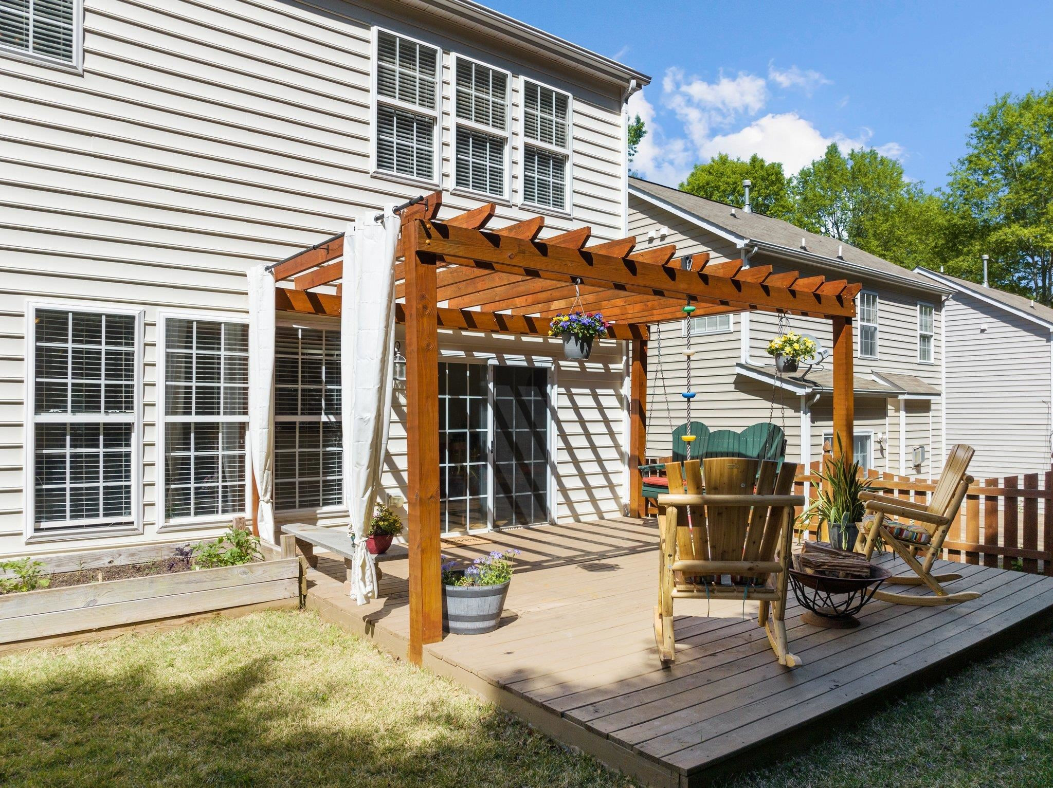 8411 Tie Stone Way Raleigh, NC 27613 - Photo 28 of 38 swimming pool view with outdoor seating