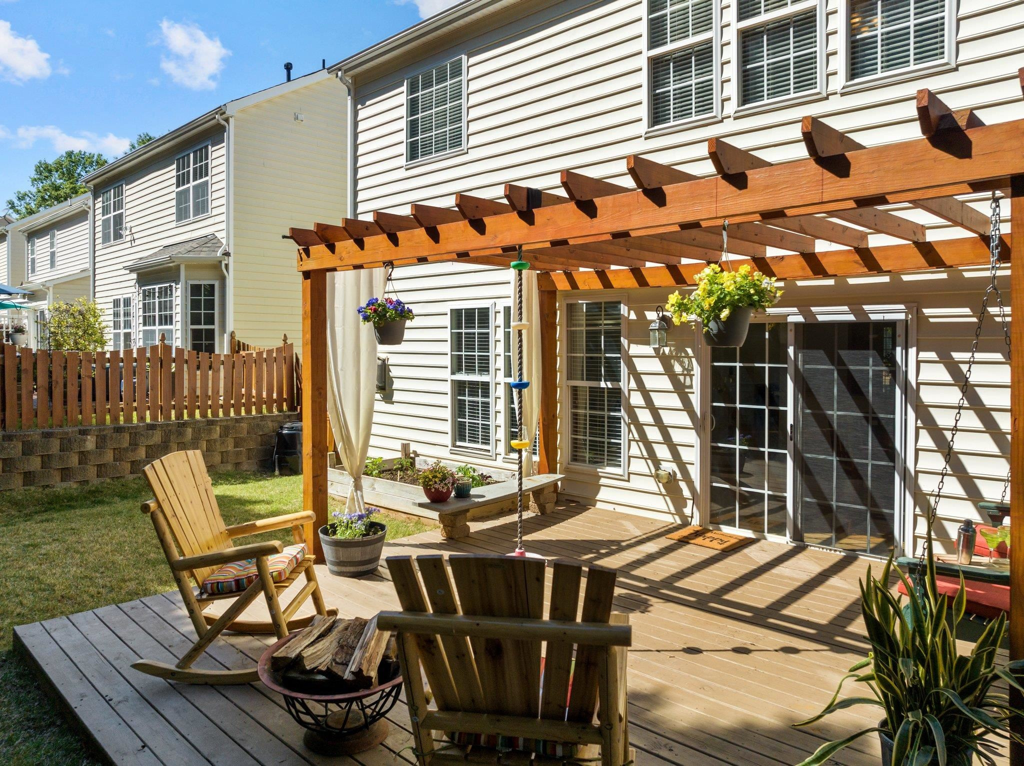 8411 Tie Stone Way Raleigh, NC 27613 - Photo 29 of 38 a view of a chairs and table in the patio