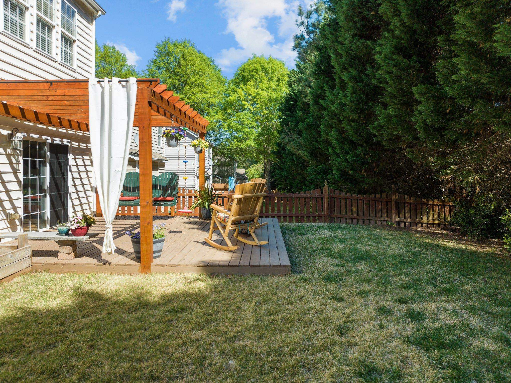 8411 Tie Stone Way Raleigh, NC 27613 - Photo 31 of 38 a view of backyard with deck