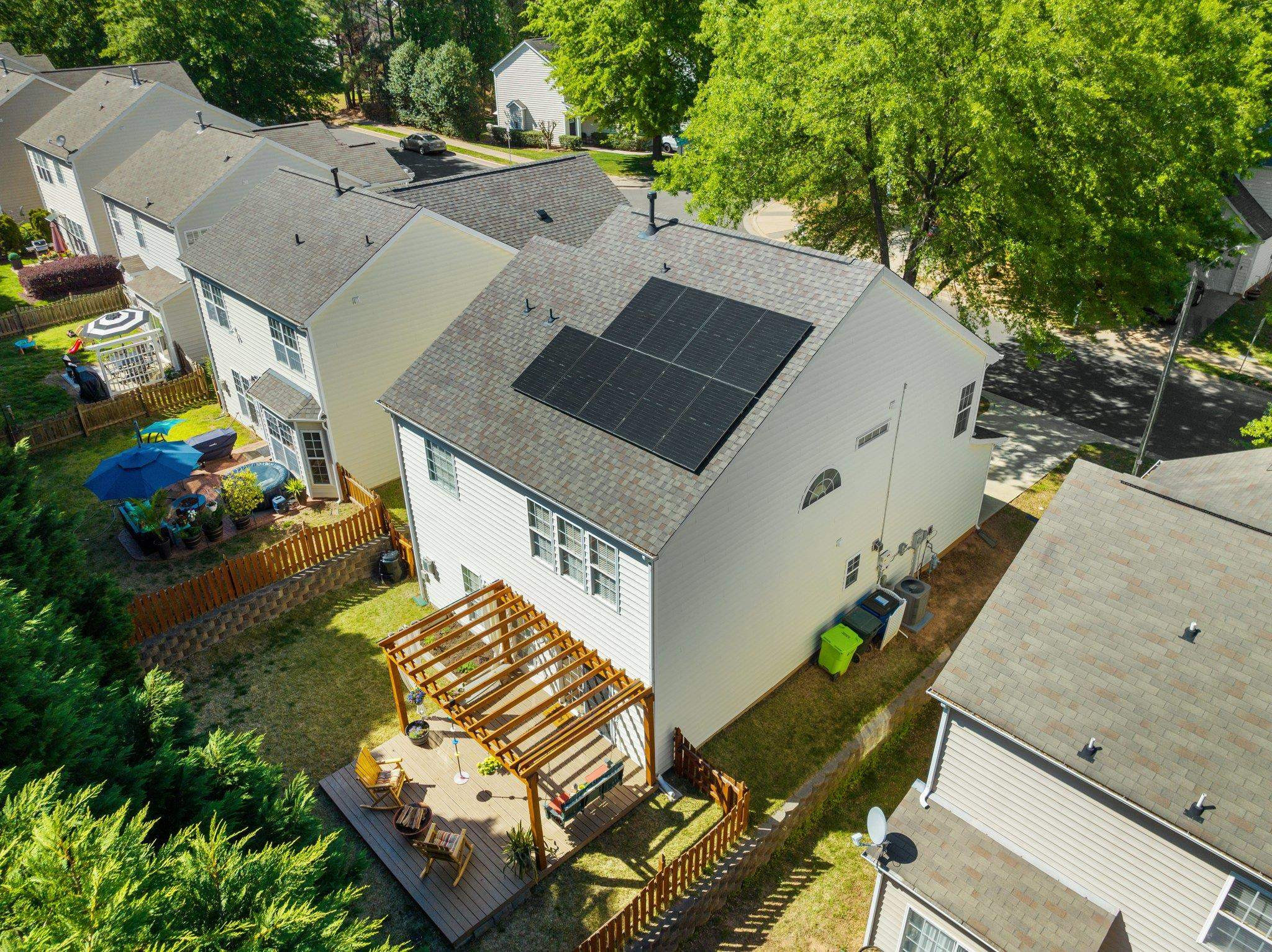 8411 Tie Stone Way Raleigh, NC 27613 - Photo 34 of 38 an aerial view of a house with a yard and balcony
