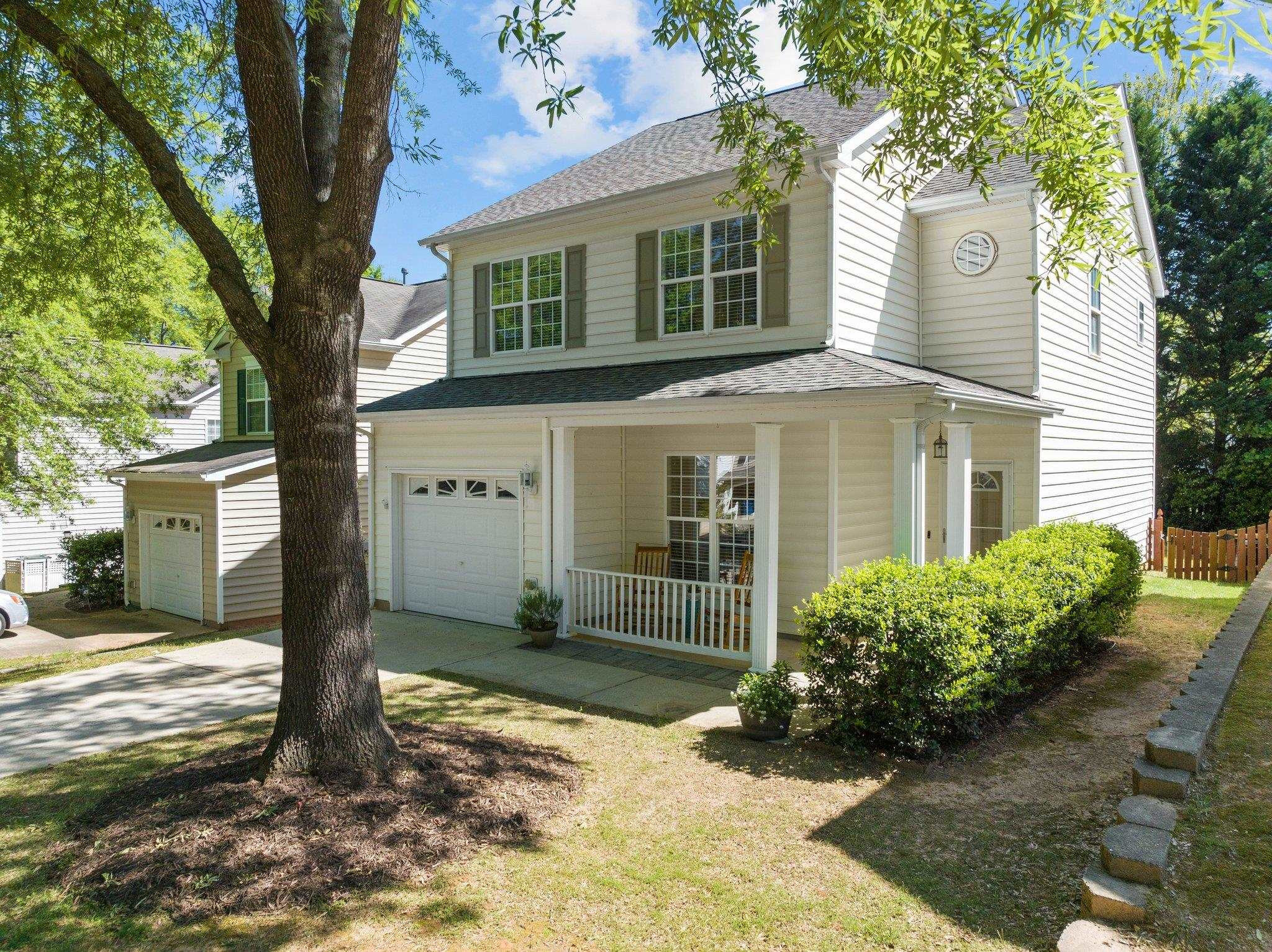 8411 Tie Stone Way Raleigh, NC 27613 - Photo 37 of 38 front view of a house with a yard