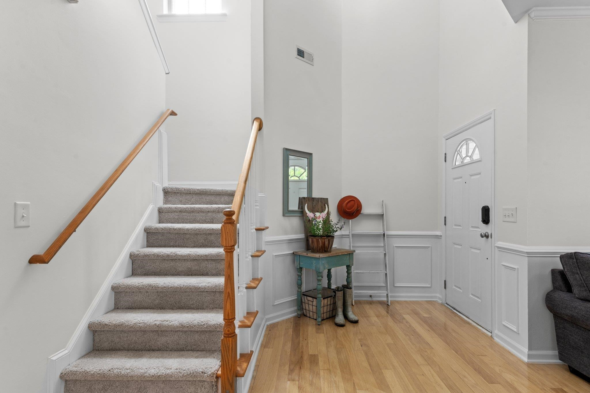 8411 Tie Stone Way Raleigh, NC 27613 - Photo 8 of 38 a view of entryway with wooden floor