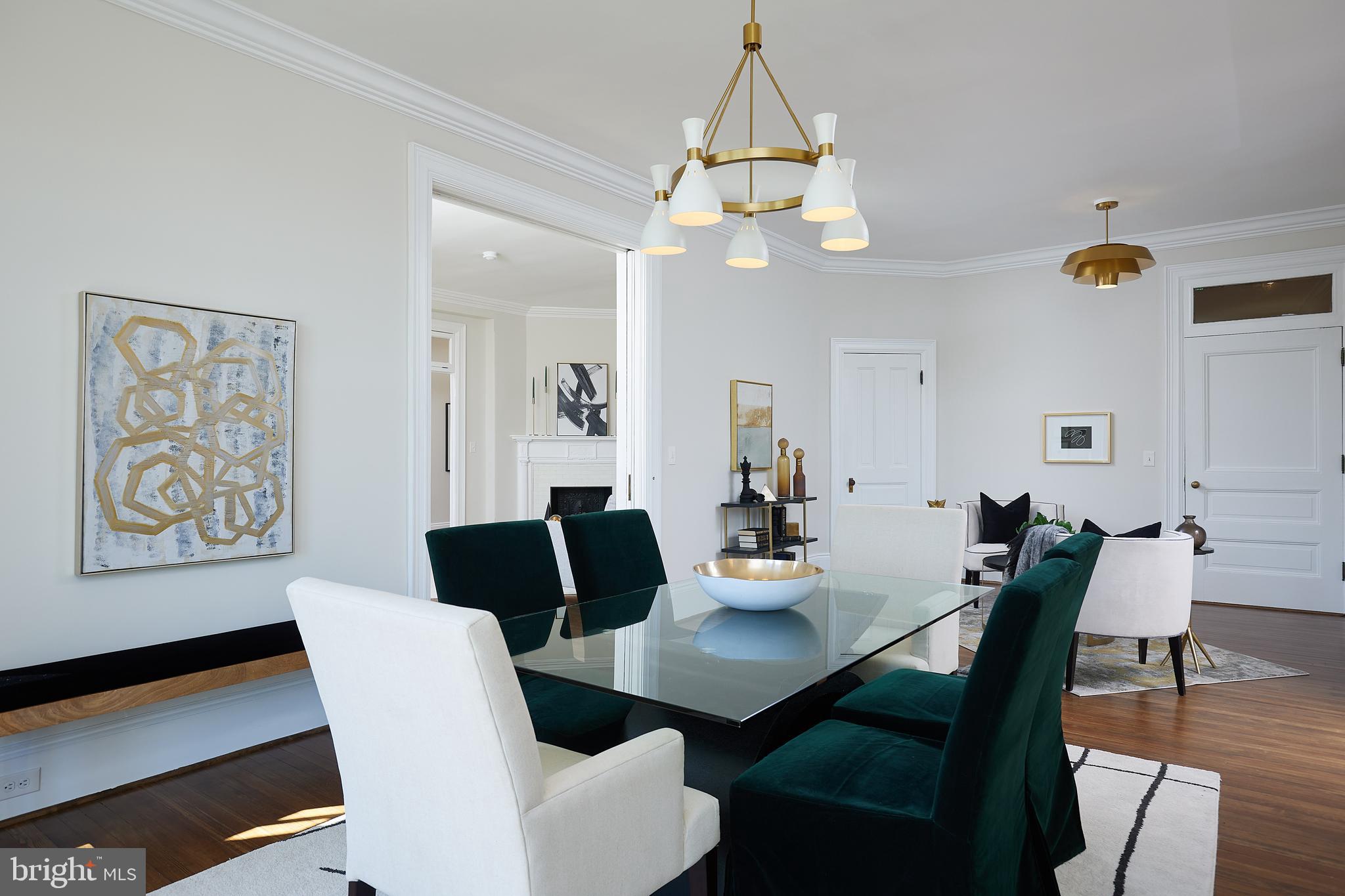 2853 Ontario Road Northwest, Unit 323 Washington, DC 20009 - Photo 14 of 66 a view of a dining room with furniture and wooden floor