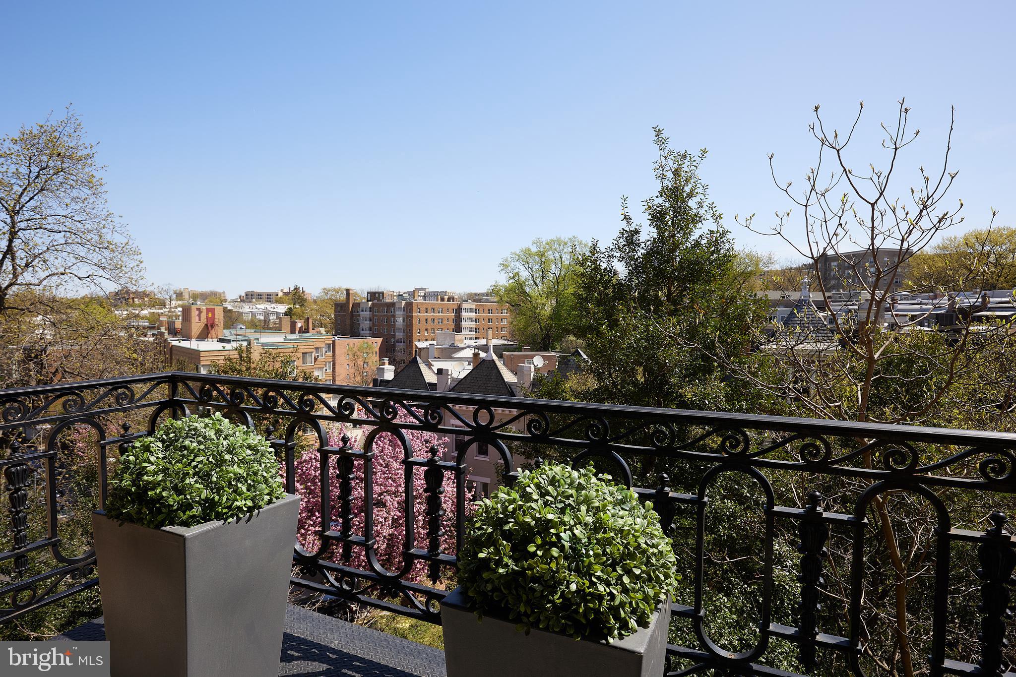 2853 Ontario Road Northwest, Unit 323 Washington, DC 20009 - Photo 47 of 66 a view of a balcony with city view