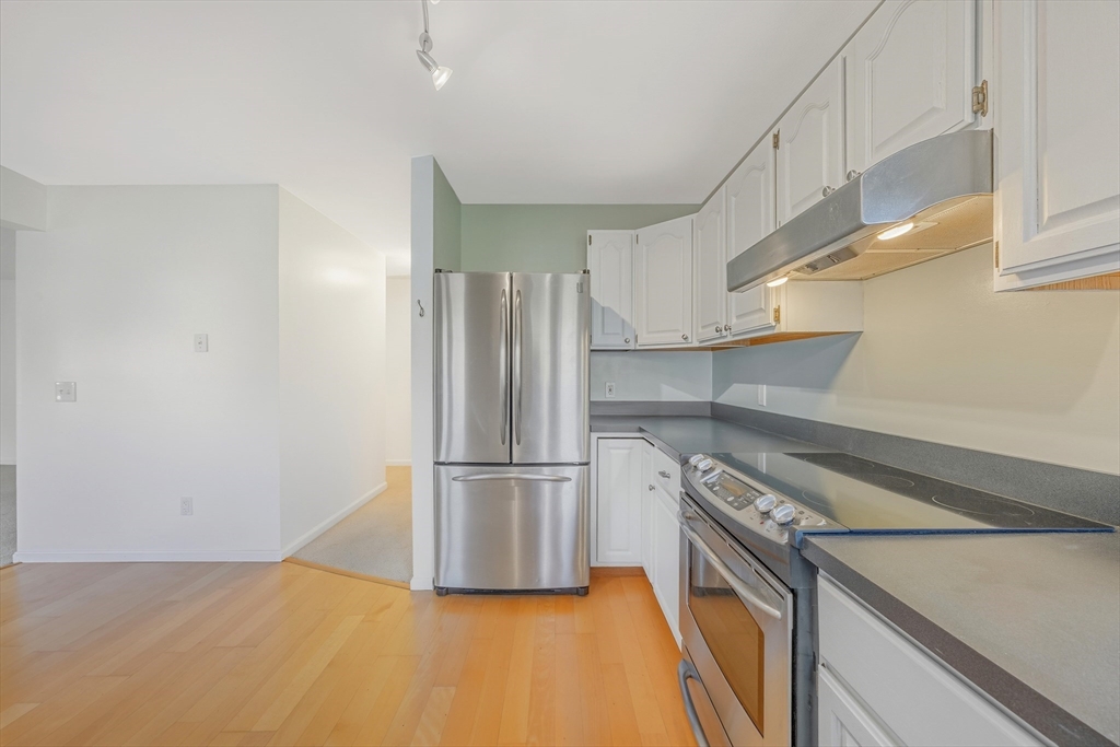 2 Pine Grove Drive, Unit 2 South Hadley, MA 01075 - Photo 11 of 34 a kitchen with cabinets and stainless steel appliances