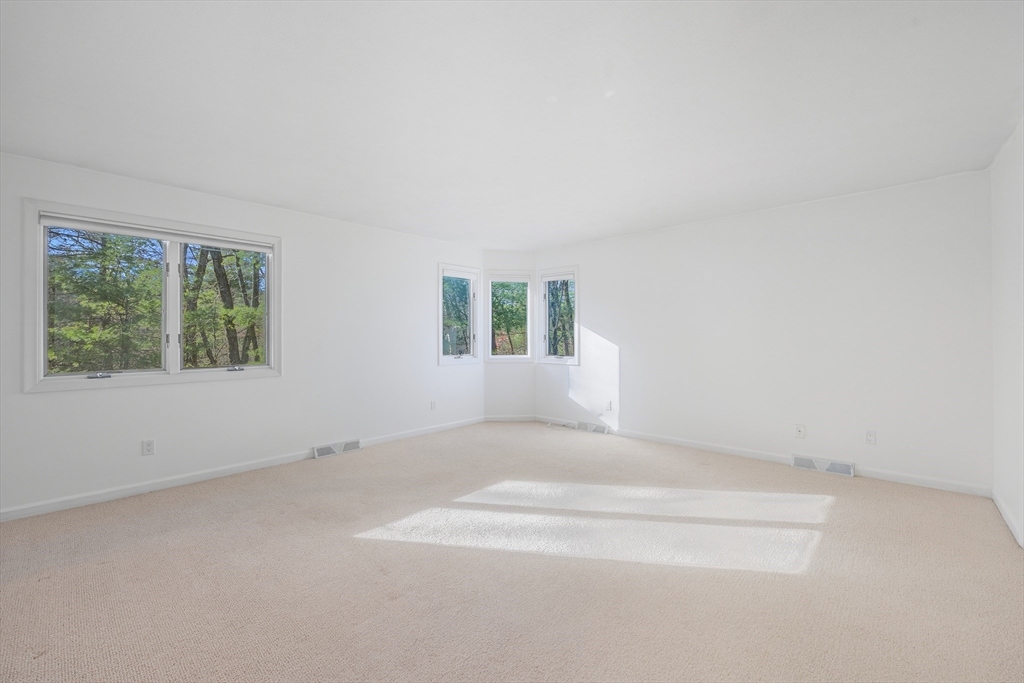 2 Pine Grove Drive, Unit 2 South Hadley, MA 01075 - Photo 18 of 34 an empty room with a window