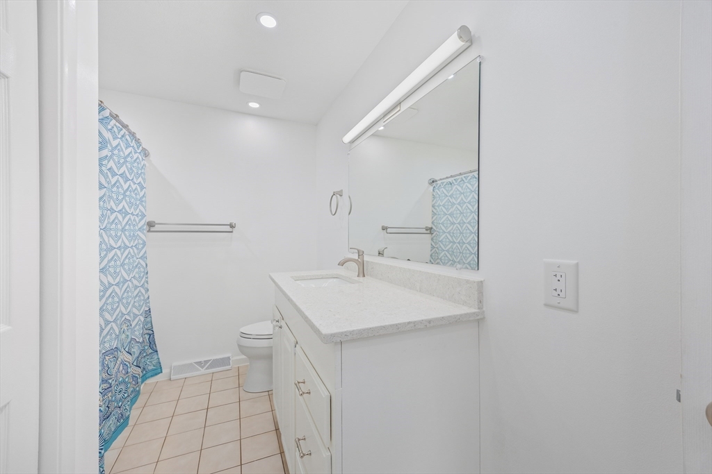 2 Pine Grove Drive, Unit 2 South Hadley, MA 01075 - Photo 22 of 34 a bathroom with a sink toilet and shower