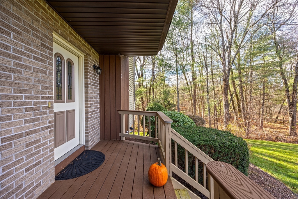 2 Pine Grove Drive, Unit 2 South Hadley, MA 01075 - Photo 4 of 34 a view of balcony with wooden floor and fence