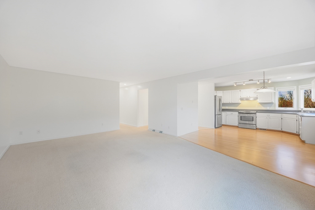 2 Pine Grove Drive, Unit 2 South Hadley, MA 01075 - Photo 5 of 34 a view of an empty room with a kitchen