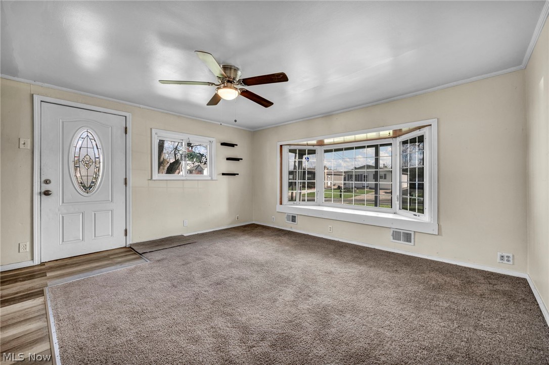 2727 McElwain Road Akron, OH 44312 - Photo 3 of 41 Living Room & ceiling fan