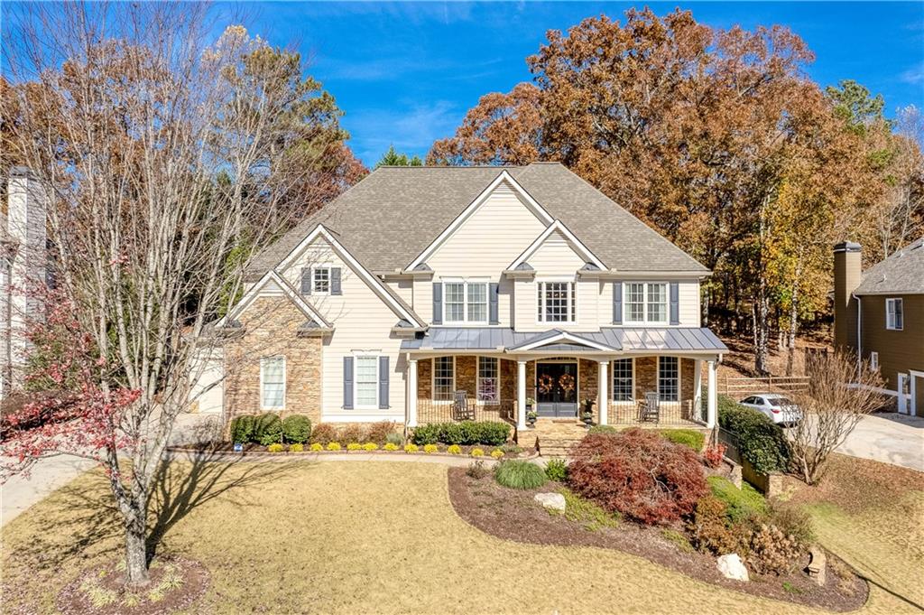 4148 Gold Mill Ridge Canton, GA 30114 - Photo 1 of 1 a front view of a house with a yard