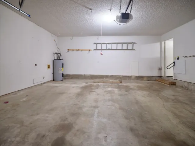 a view of a backyard with sitting area