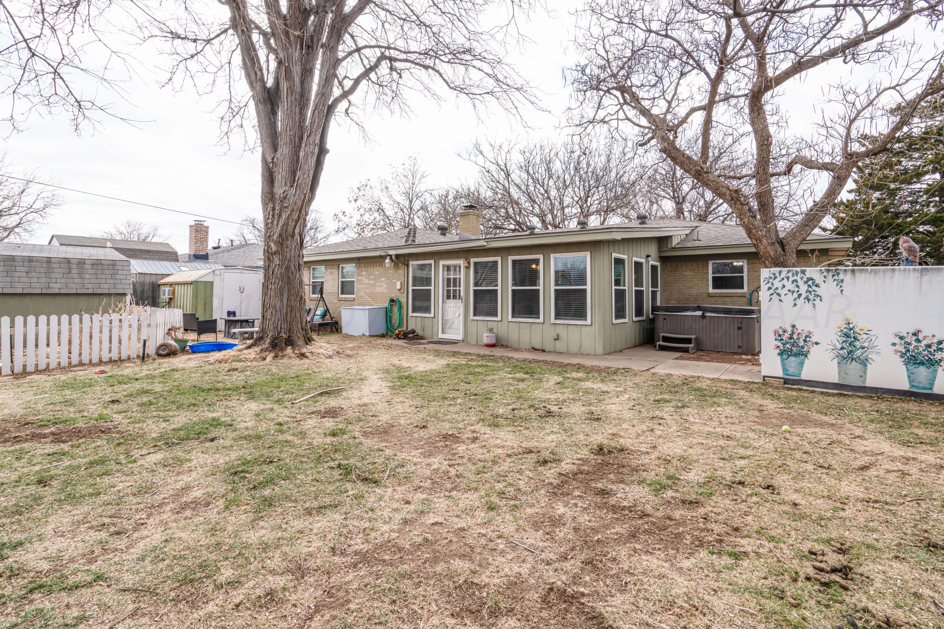 4513 Mesa Circle Amarillo, TX 79109 - Photo 17 of 18 front view of a house with a yard