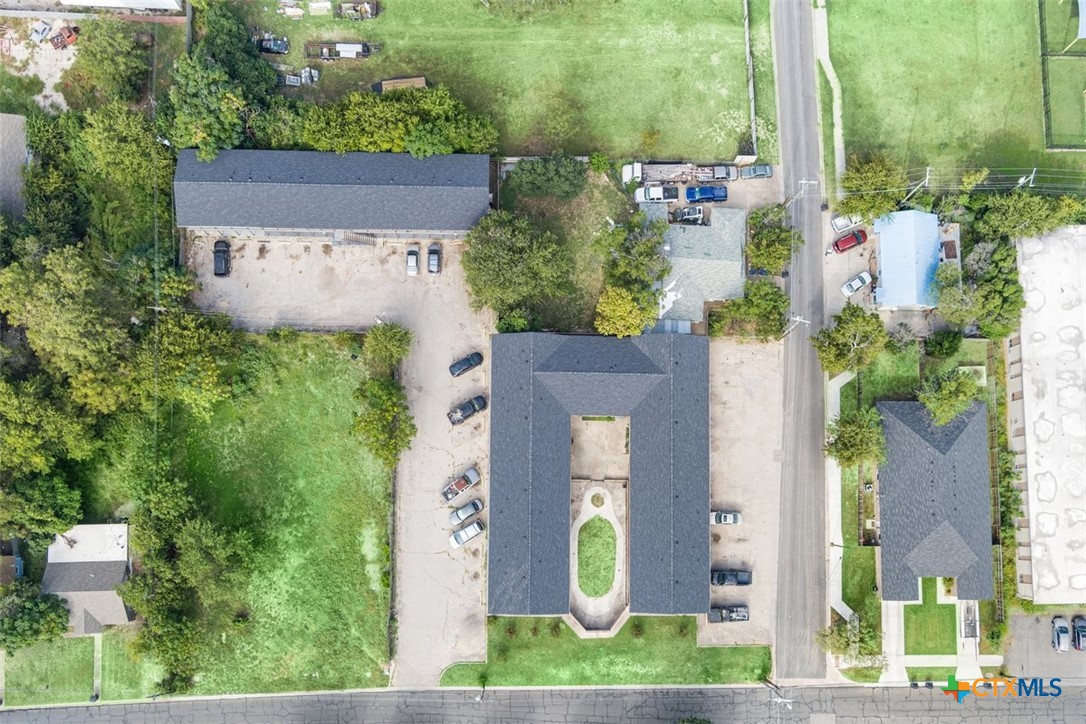 209 Root Avenue Killeen, TX 76541 - Photo 6 of 7 an aerial view of a house with a yard and garden