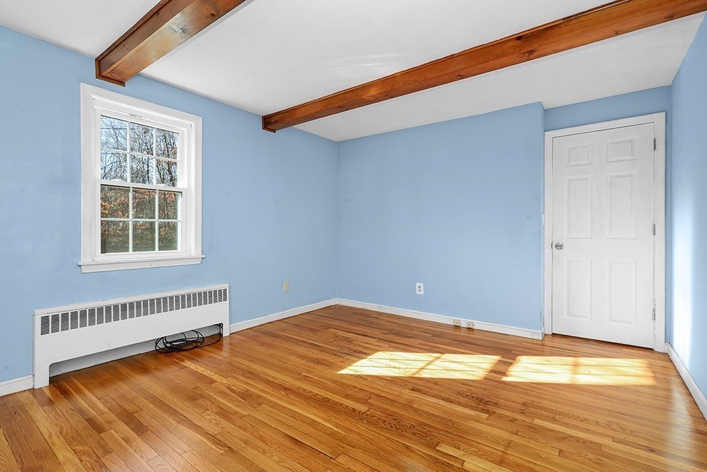 8 Autumn Lane Walpole, MA 02081 - Photo 12 of 28 a view of an empty room with a window