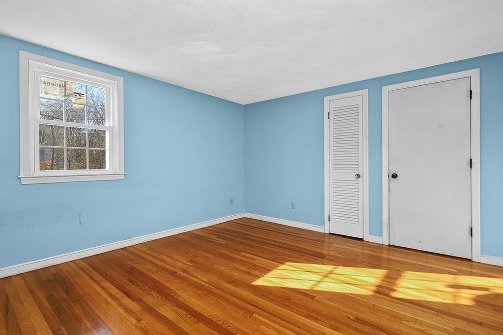 8 Autumn Lane Walpole, MA 02081 - Photo 15 of 28 a view of a room with wooden floor and cabinet