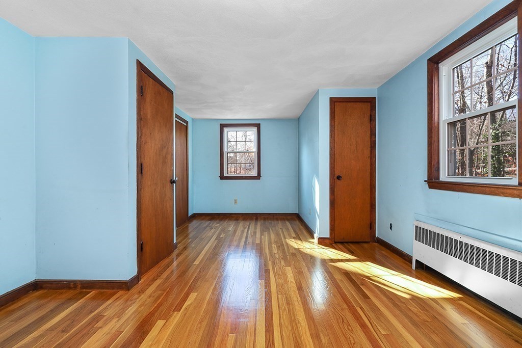 8 Autumn Lane Walpole, MA 02081 - Photo 18 of 28 a view of a room with wooden floor and windows