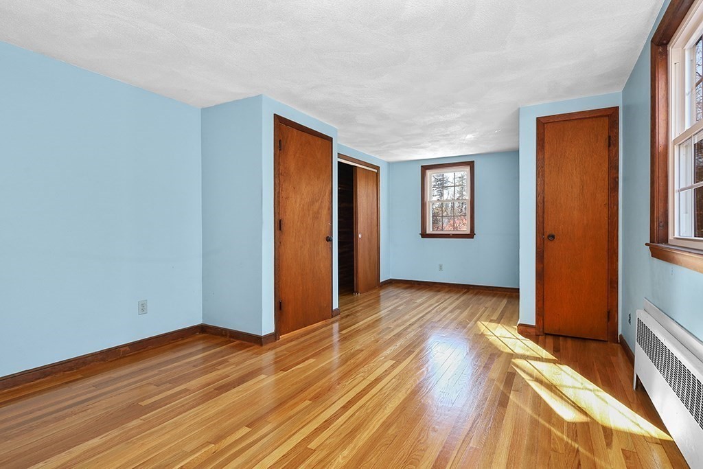 8 Autumn Lane Walpole, MA 02081 - Photo 19 of 28 a view of hallway with wooden floor