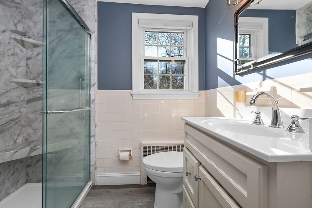 8 Autumn Lane Walpole, MA 02081 - Photo 20 of 28 a bathroom with a sink toilet and shower