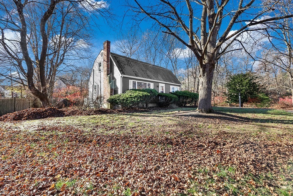 8 Autumn Lane Walpole, MA 02081 - Photo 3 of 28 a front view of a house with a yard