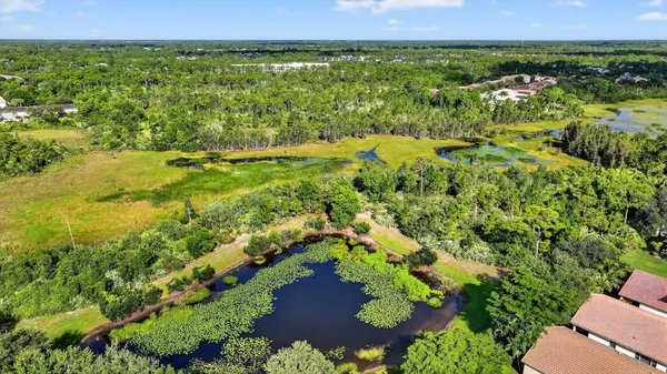 a view of a garden with an ocean