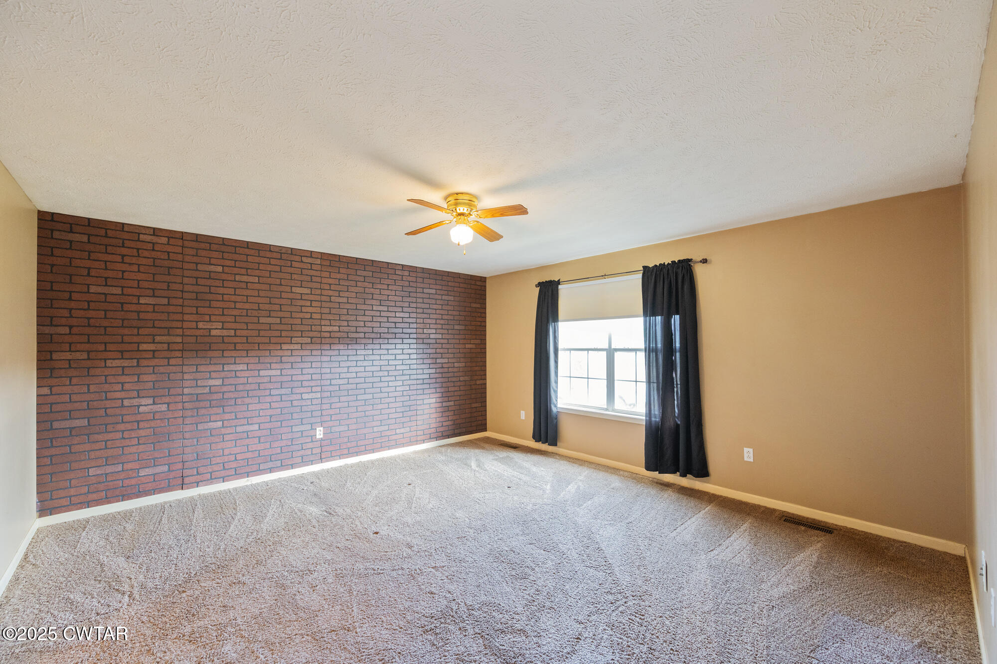750 Northwind Loop Lexington, TN 38351 - Photo 12 of 33 a view of an empty room with a window